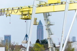 Germany, Hesse, Frankfurt, industrial plant on the Main, in the background the Messeturm. Germany, Hesse, Frankfurt, industrial plant on the Main, in the background the Messeturm.